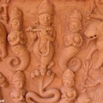 Terracotta Tablet depicting Krishna on top of a 5 hooded snake at Urusvati Museum of Folklore