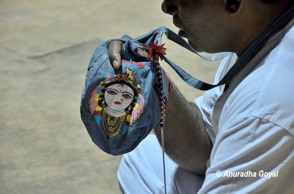 A devotee praying to Radha Krishna at Braj Bhoomi