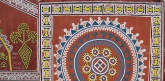 Tribal motifs on the walls of Purkhauti Muktangan