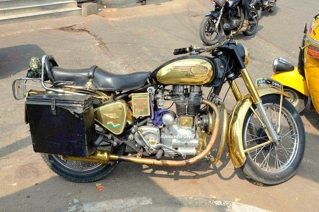 A Golden colored Motor Bike on the streets of Shah Ali Banda, Hyderabad