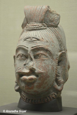 Shiva Head Stone Sculpture on display