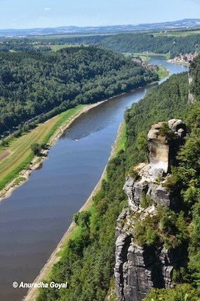 Elbe river flowing beside the Bastei Rocks, Saxon Switzerland