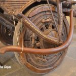 Intricately carved wooden Wheel at Goa Chakra Museum
