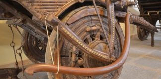 Intricately carved wooden Wheel at Goa Chakra Museum