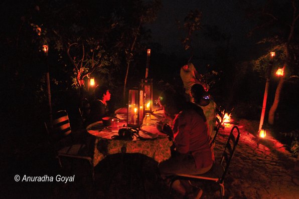 Candlelit dinner by the Denwa river backwaters