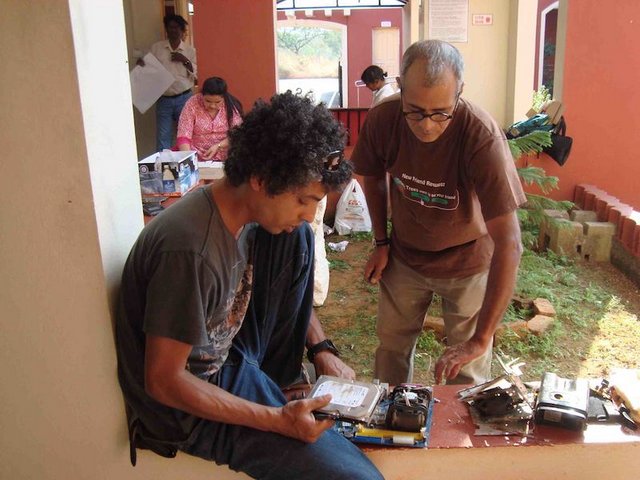 Dismantling the Electronic waste to recycle at Utopia Dystopia project