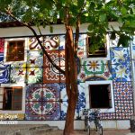 A colorful tiled wall at Fontainhas