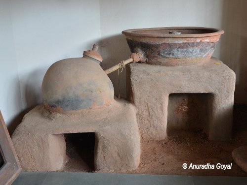 Cashew Feni making utensils at Goa Chitra