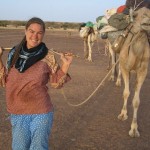 Paula Constant with her camels in Sahara Desert
