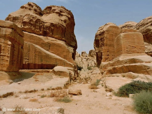 Walk through the rocks to reach Petra