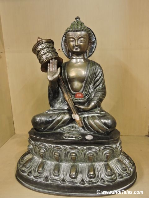 Buddha with Prayer Wheel as Sikkim Souvenirs