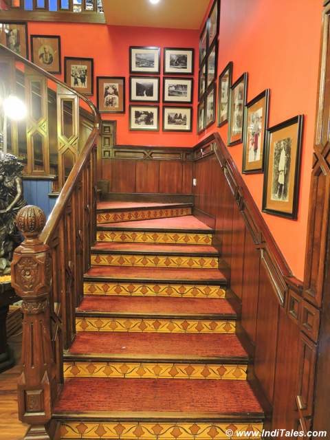 Wooden Staircase with old black & white pictures