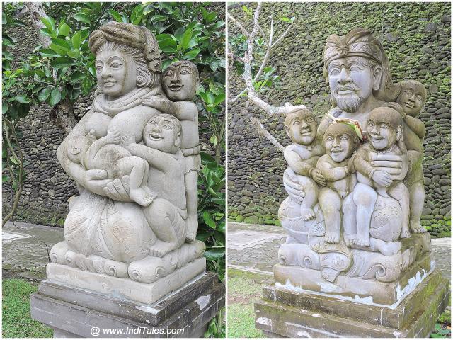 Sculptures outside Tirta Empul Temple - Bali, father with children, mother with children