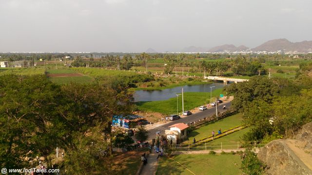 The lush green landscape around