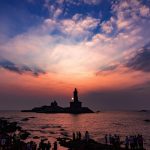 Top Kanyakumari Tourist Places To Visit Sunset scene by Vivekananda Rock Memorial & Thiruvalluvar Statue