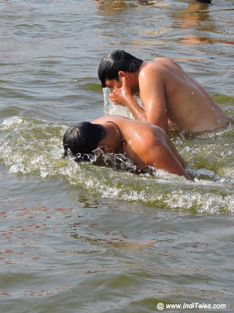 A holy dip at Sangam