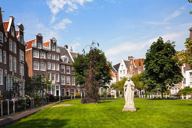 Cityscape Begijnhof one of the oldest inner courts of Amsterdam