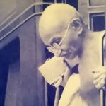 Gandhiji alighting from train