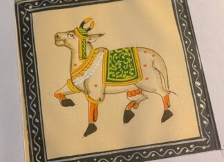 Decorative cow painting - a sacred, recurring motif symbolizing abundance, protection, and divinity