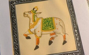 Decorative cow painting - a sacred, recurring motif symbolizing abundance, protection, and divinity